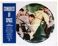 #306 CONQUEST OF SPACE lobby card #8 '55 carrying a spacesuit!!