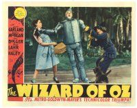 9f095 WIZARD OF OZ LC '39 Judy Garland & Ray Bolger help leaning Jack Haley, and Toto too!